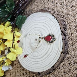 Crimson Pearl Drop Invisible Chain Pendant